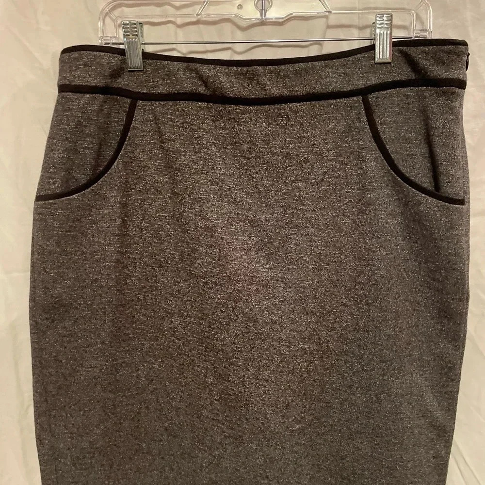 The limited  gray skirt size 14